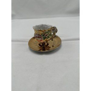 vintage gold& white with rose & footed feet & thumb handle